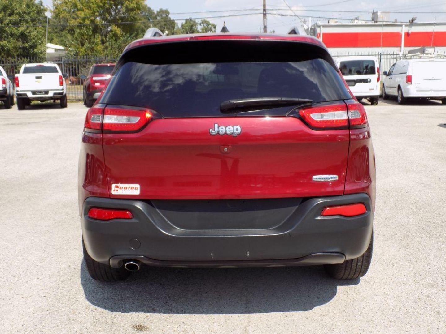 2016 RED JEEP CHEROKEE LATITUDE (1C4PJLCB9GW) with an 2.4L engine, Automatic transmission, located at 830 E. Canino Rd., Houston, TX, 77037, (281) 405-0440, 38.358219, -81.729942 - Photo#4