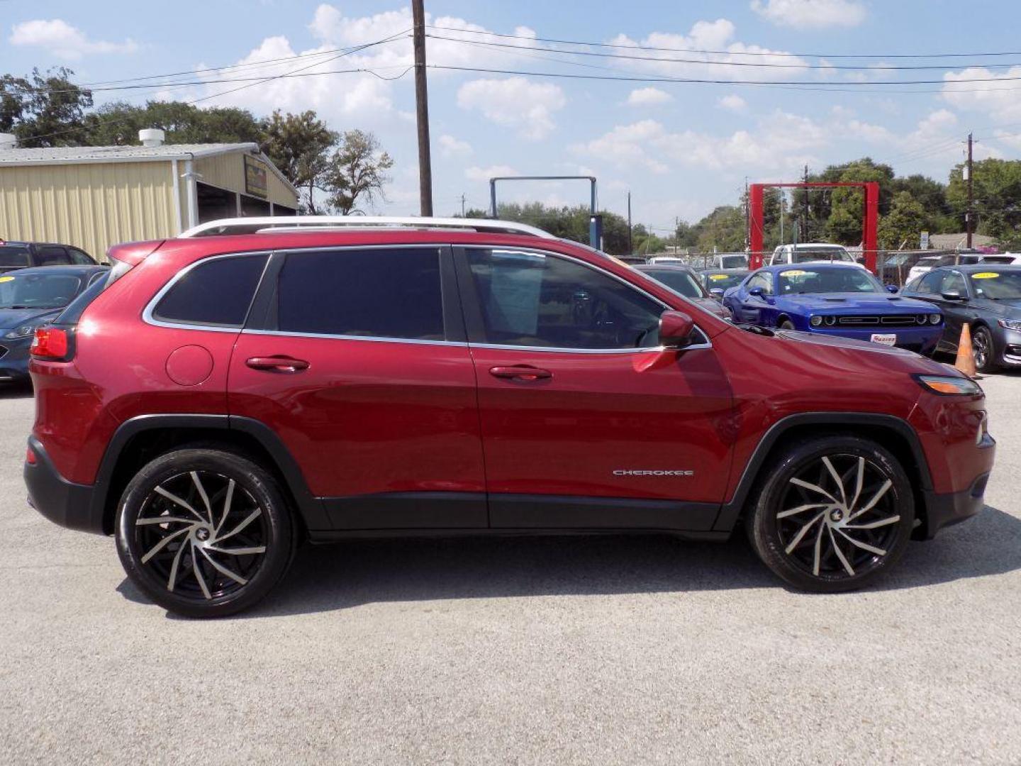 2016 RED JEEP CHEROKEE LATITUDE (1C4PJLCB9GW) with an 2.4L engine, Automatic transmission, located at 830 E. Canino Rd., Houston, TX, 77037, (281) 405-0440, 38.358219, -81.729942 - Photo#6