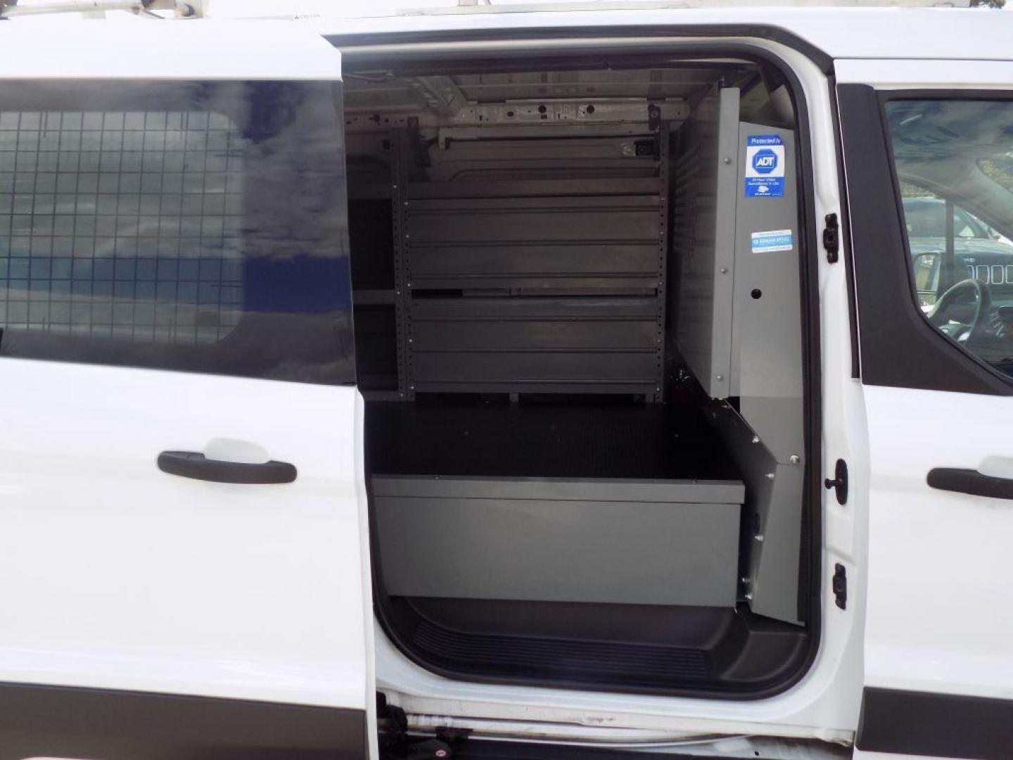 2016 WHITE FORD TRANSIT CONNECT XLT (NM0LS7F73G1) with an 2.5L engine, Automatic transmission, located at 830 E. Canino Rd., Houston, TX, 77037, (281) 405-0440, 38.358219, -81.729942 - Photo#12