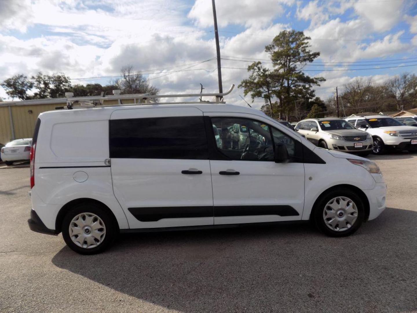 2016 WHITE FORD TRANSIT CONNECT XLT (NM0LS7F73G1) with an 2.5L engine, Automatic transmission, located at 830 E. Canino Rd., Houston, TX, 77037, (281) 405-0440, 38.358219, -81.729942 - Photo#13