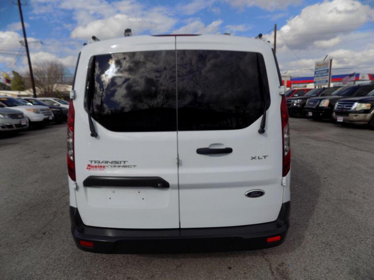 2016 WHITE FORD TRANSIT CONNECT XLT (NM0LS7F73G1) with an 2.5L engine, Automatic transmission, located at 830 E. Canino Rd., Houston, TX, 77037, (281) 405-0440, 38.358219, -81.729942 - Photo#14