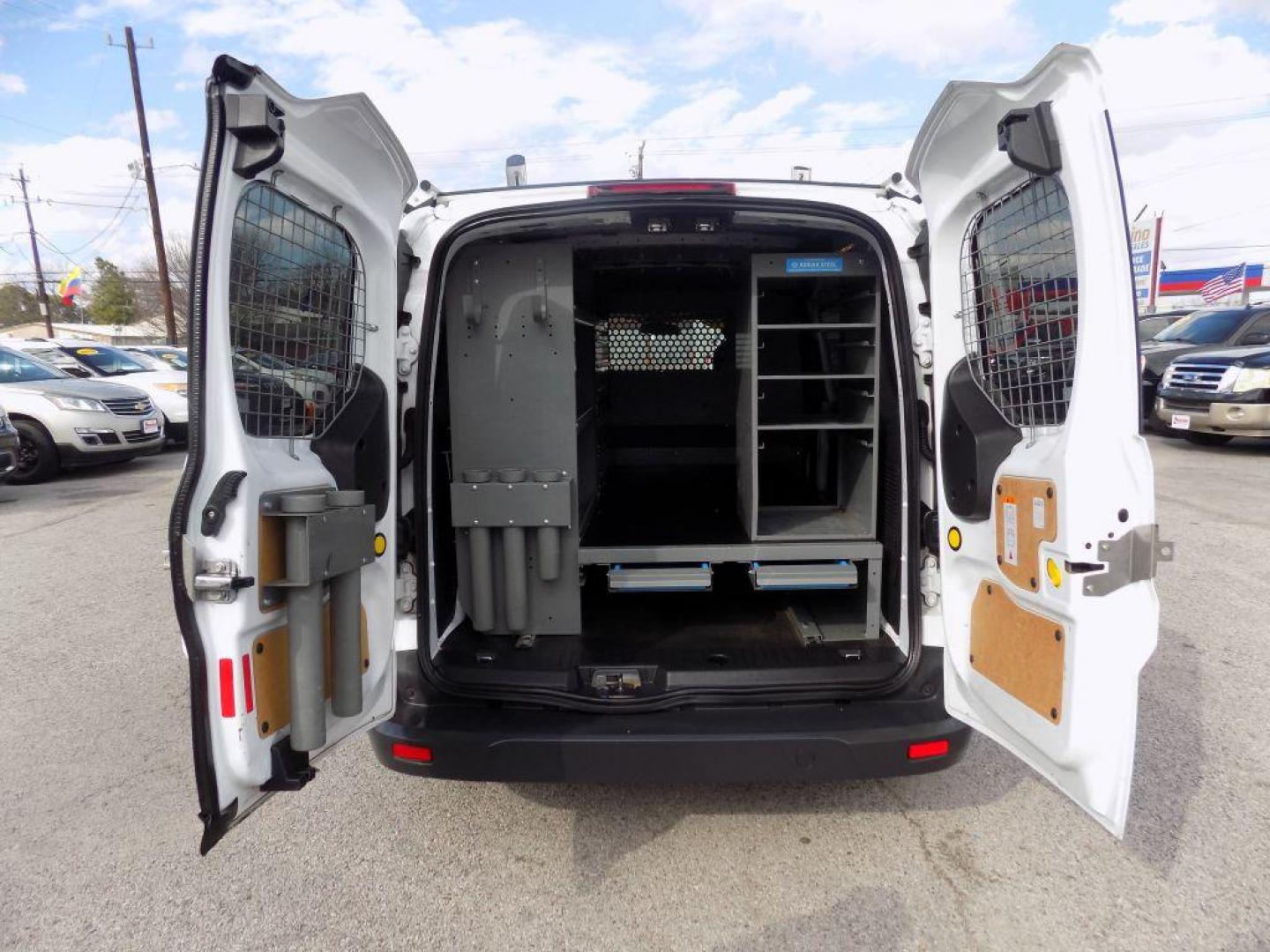 2016 WHITE FORD TRANSIT CONNECT XLT (NM0LS7F73G1) with an 2.5L engine, Automatic transmission, located at 830 E. Canino Rd., Houston, TX, 77037, (281) 405-0440, 38.358219, -81.729942 - Photo#15