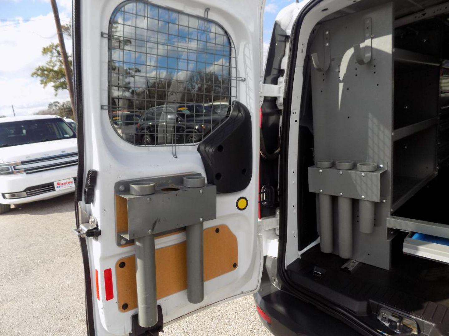 2016 WHITE FORD TRANSIT CONNECT XLT (NM0LS7F73G1) with an 2.5L engine, Automatic transmission, located at 830 E. Canino Rd., Houston, TX, 77037, (281) 405-0440, 38.358219, -81.729942 - Photo#17