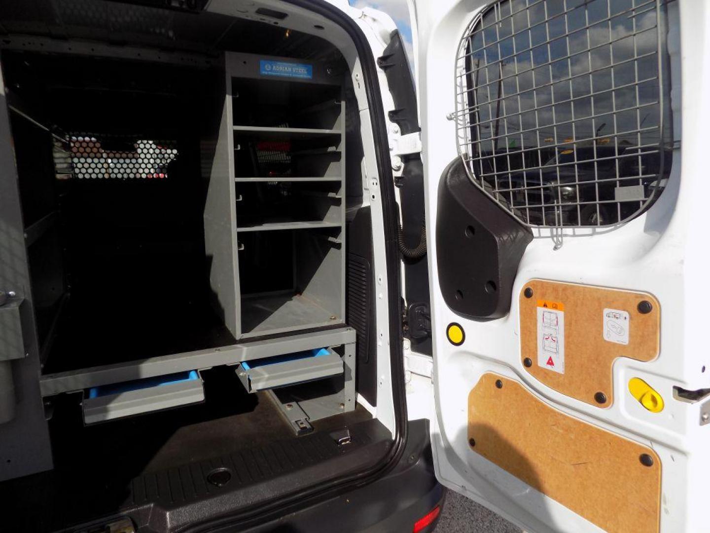 2016 WHITE FORD TRANSIT CONNECT XLT (NM0LS7F73G1) with an 2.5L engine, Automatic transmission, located at 830 E. Canino Rd., Houston, TX, 77037, (281) 405-0440, 38.358219, -81.729942 - Photo#18