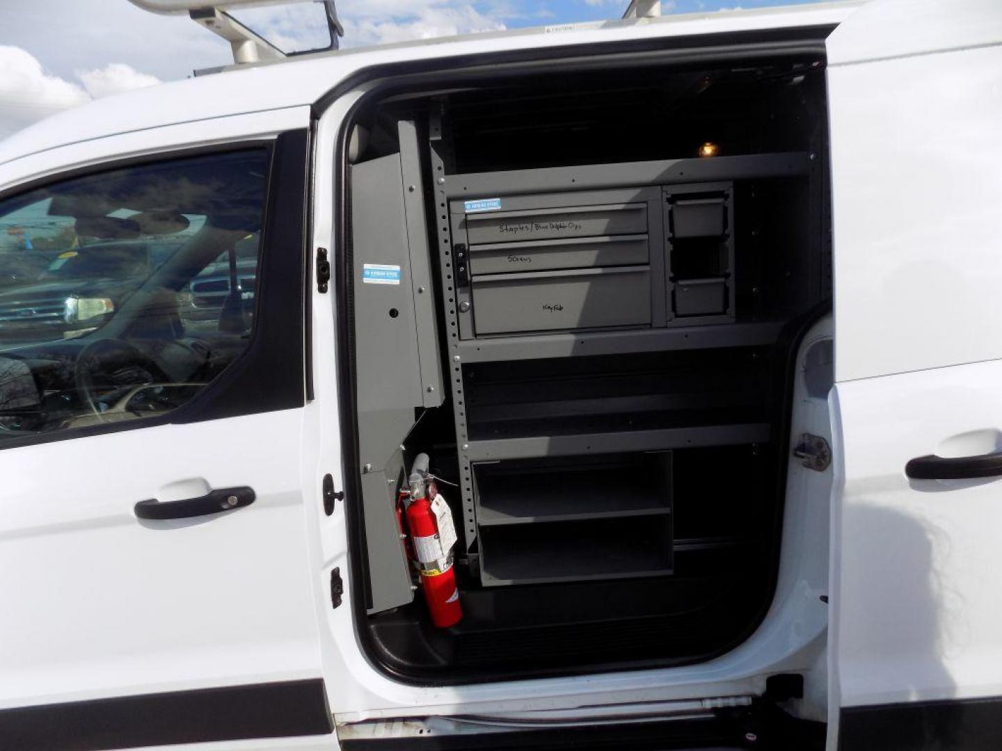 2016 WHITE FORD TRANSIT CONNECT XLT (NM0LS7F73G1) with an 2.5L engine, Automatic transmission, located at 830 E. Canino Rd., Houston, TX, 77037, (281) 405-0440, 38.358219, -81.729942 - Photo#20