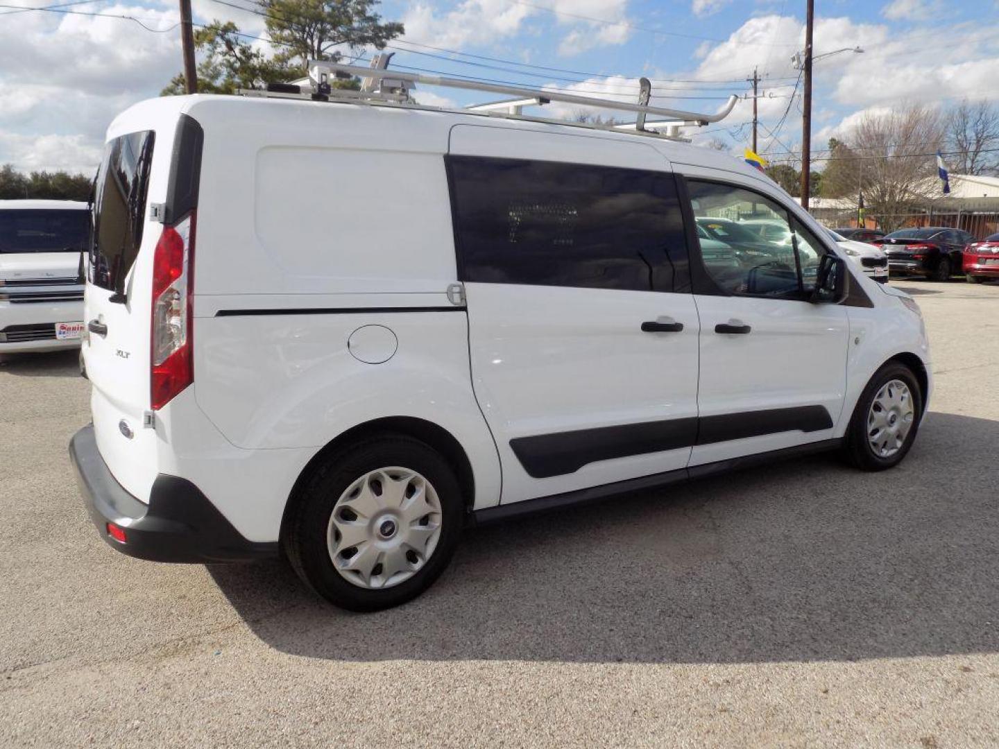 2016 WHITE FORD TRANSIT CONNECT XLT (NM0LS7F73G1) with an 2.5L engine, Automatic transmission, located at 830 E. Canino Rd., Houston, TX, 77037, (281) 405-0440, 38.358219, -81.729942 - Photo#2