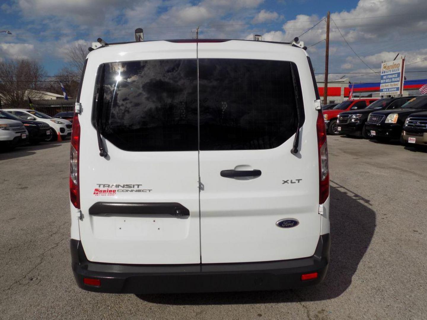 2016 WHITE FORD TRANSIT CONNECT XLT (NM0LS7F73G1) with an 2.5L engine, Automatic transmission, located at 830 E. Canino Rd., Houston, TX, 77037, (281) 405-0440, 38.358219, -81.729942 - Photo#3