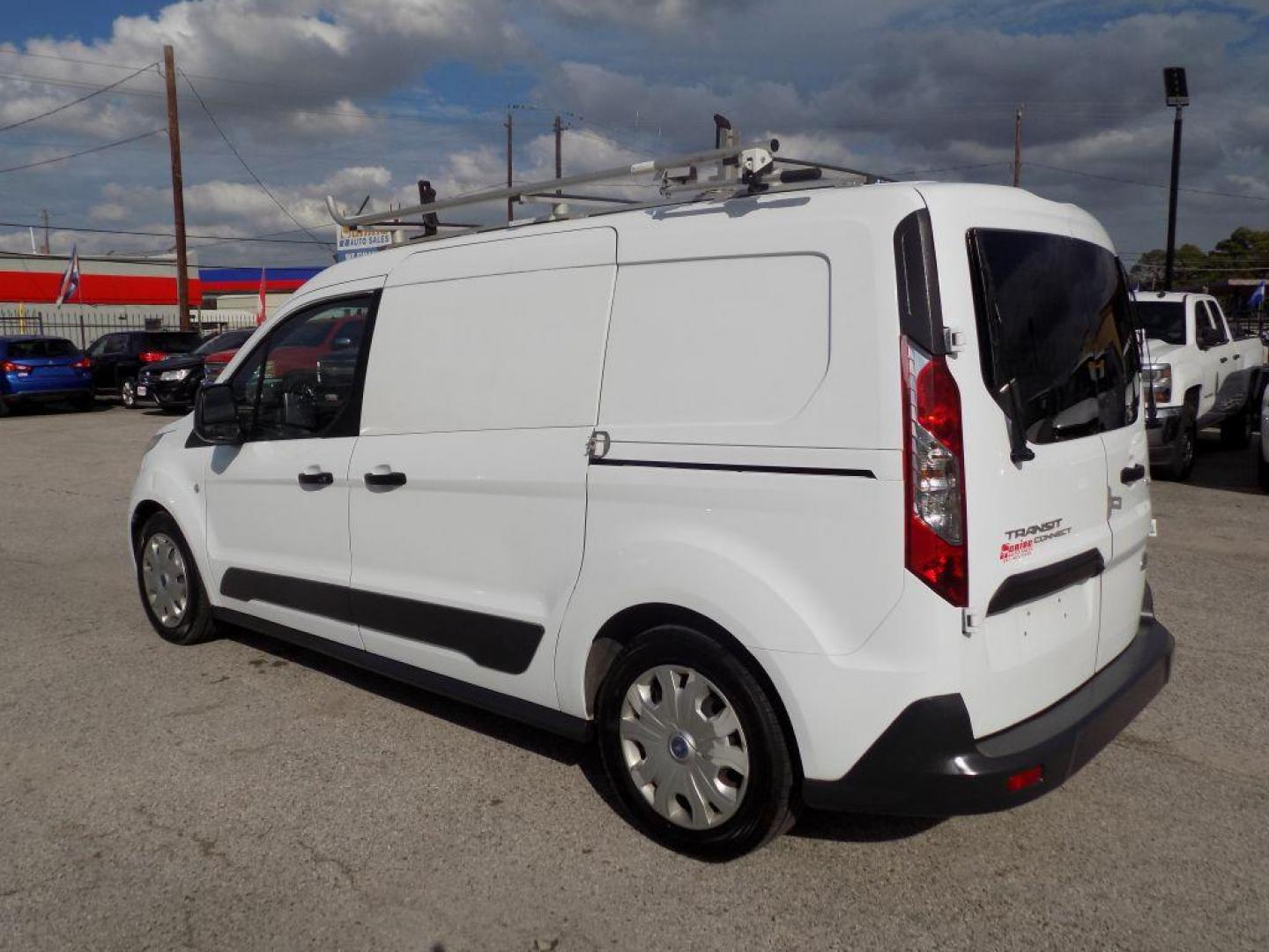 2016 WHITE FORD TRANSIT CONNECT XLT (NM0LS7F73G1) with an 2.5L engine, Automatic transmission, located at 830 E. Canino Rd., Houston, TX, 77037, (281) 405-0440, 38.358219, -81.729942 - Photo#4