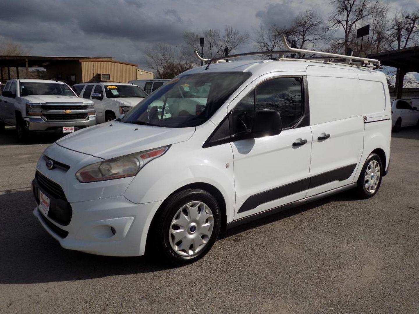 2016 WHITE FORD TRANSIT CONNECT XLT (NM0LS7F73G1) with an 2.5L engine, Automatic transmission, located at 830 E. Canino Rd., Houston, TX, 77037, (281) 405-0440, 38.358219, -81.729942 - Photo#5
