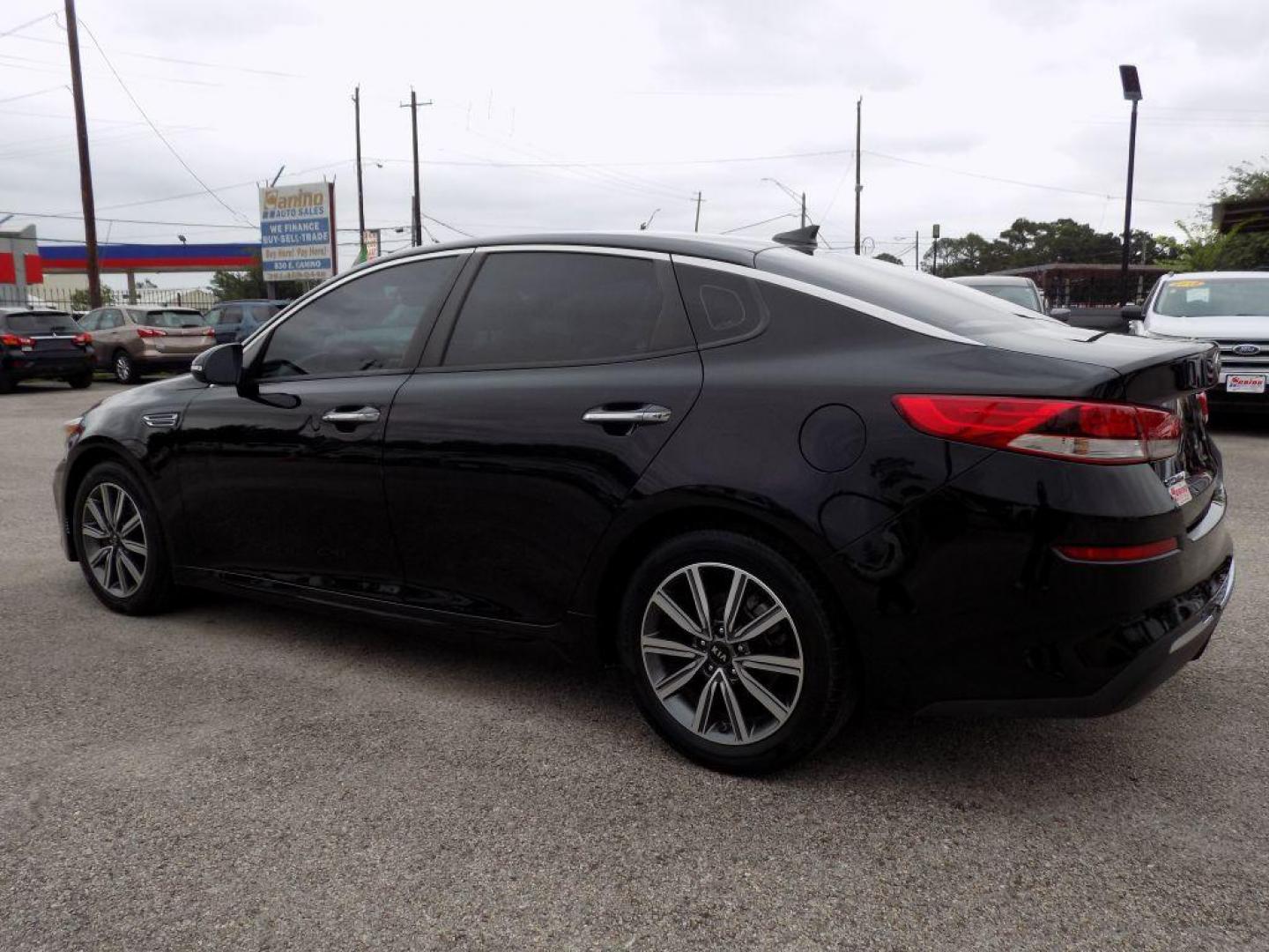 2019 BLACK KIA OPTIMA LX (5XXGT4L38KG) with an 2.4L engine, Automatic transmission, located at 830 E. Canino Rd., Houston, TX, 77037, (281) 405-0440, 38.358219, -81.729942 - Photo#3