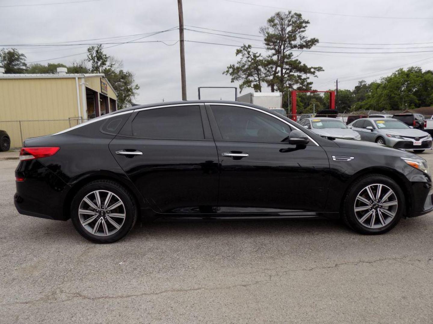 2019 BLACK KIA OPTIMA LX (5XXGT4L38KG) with an 2.4L engine, Automatic transmission, located at 830 E. Canino Rd., Houston, TX, 77037, (281) 405-0440, 38.358219, -81.729942 - Photo#6