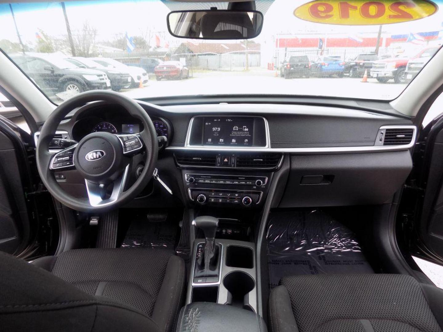 2019 BLACK KIA OPTIMA LX (5XXGT4L38KG) with an 2.4L engine, Automatic transmission, located at 830 E. Canino Rd., Houston, TX, 77037, (281) 405-0440, 38.358219, -81.729942 - Photo#19