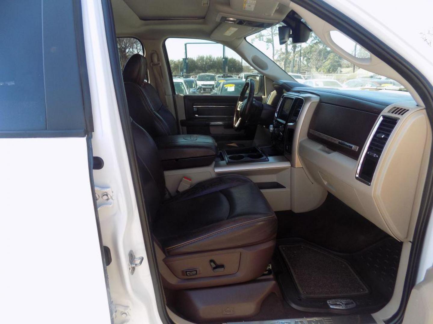 2015 WHITE RAM 1500 LONGHORN (1C6RR6PT9FS) with an 5.7L engine, Automatic transmission, located at 830 E. Canino Rd., Houston, TX, 77037, (281) 405-0440, 38.358219, -81.729942 - Photo#9