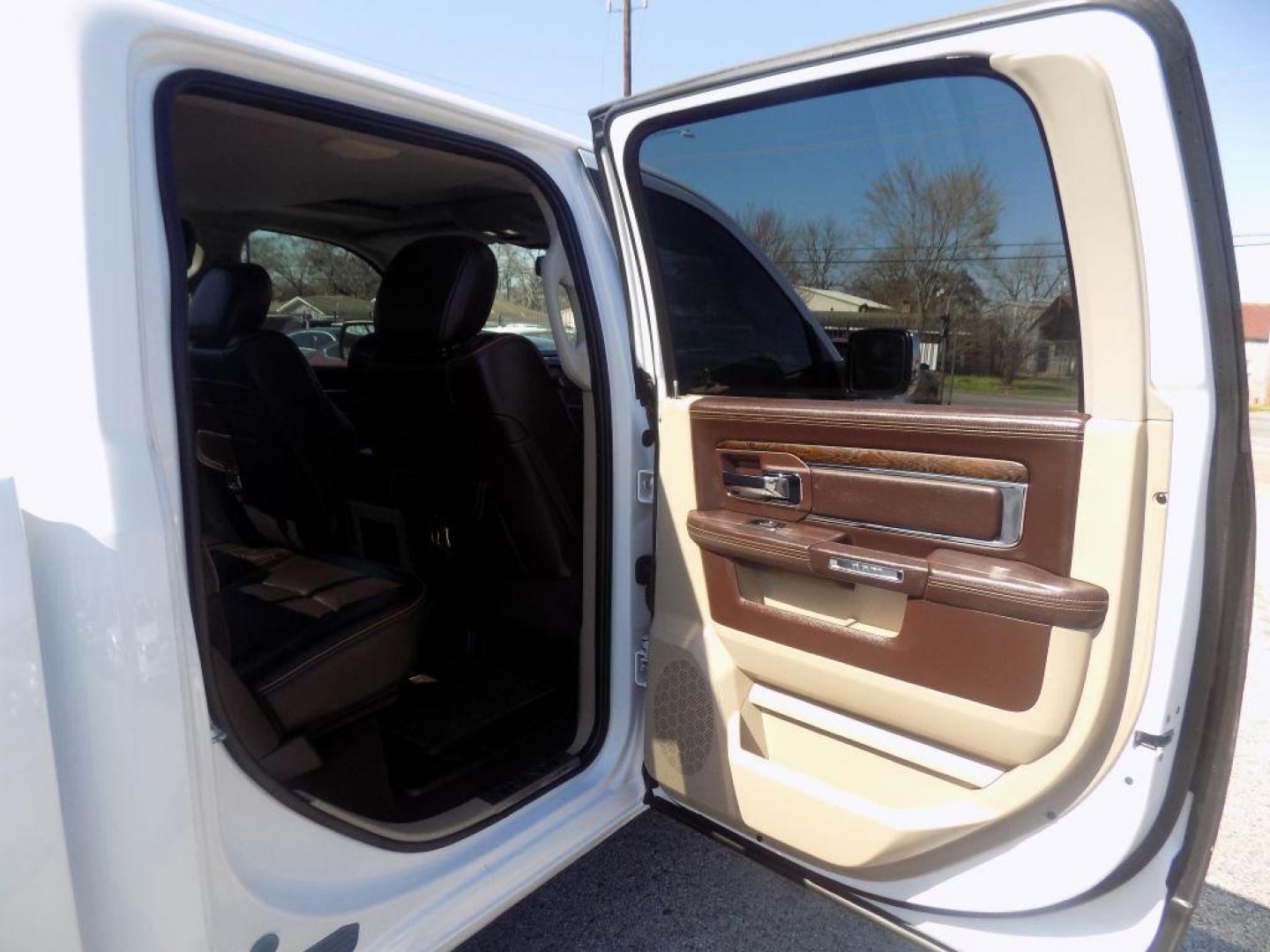 2015 WHITE RAM 1500 LONGHORN (1C6RR6PT9FS) with an 5.7L engine, Automatic transmission, located at 830 E. Canino Rd., Houston, TX, 77037, (281) 405-0440, 38.358219, -81.729942 - Photo#10