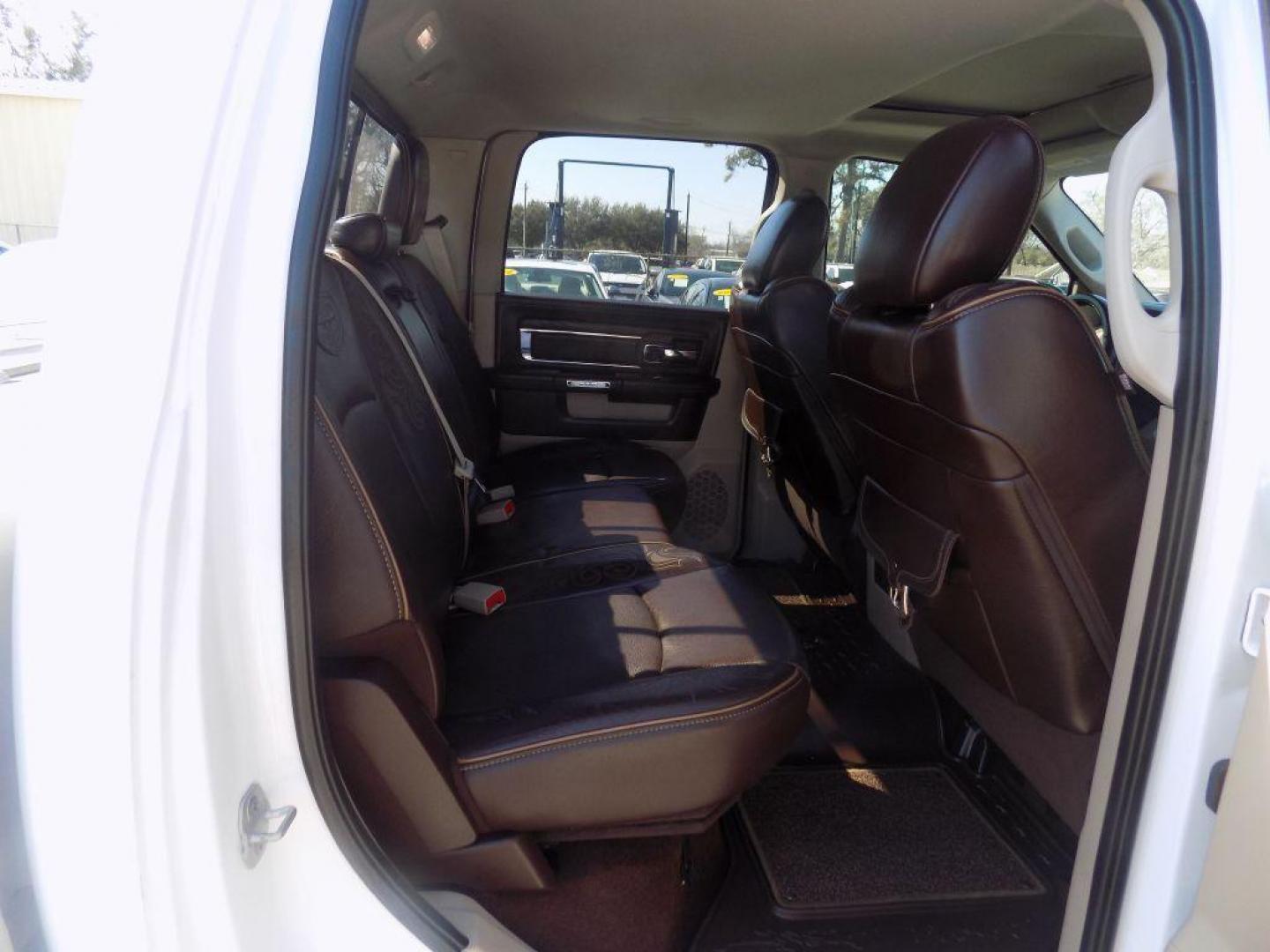 2015 WHITE RAM 1500 LONGHORN (1C6RR6PT9FS) with an 5.7L engine, Automatic transmission, located at 830 E. Canino Rd., Houston, TX, 77037, (281) 405-0440, 38.358219, -81.729942 - Photo#11