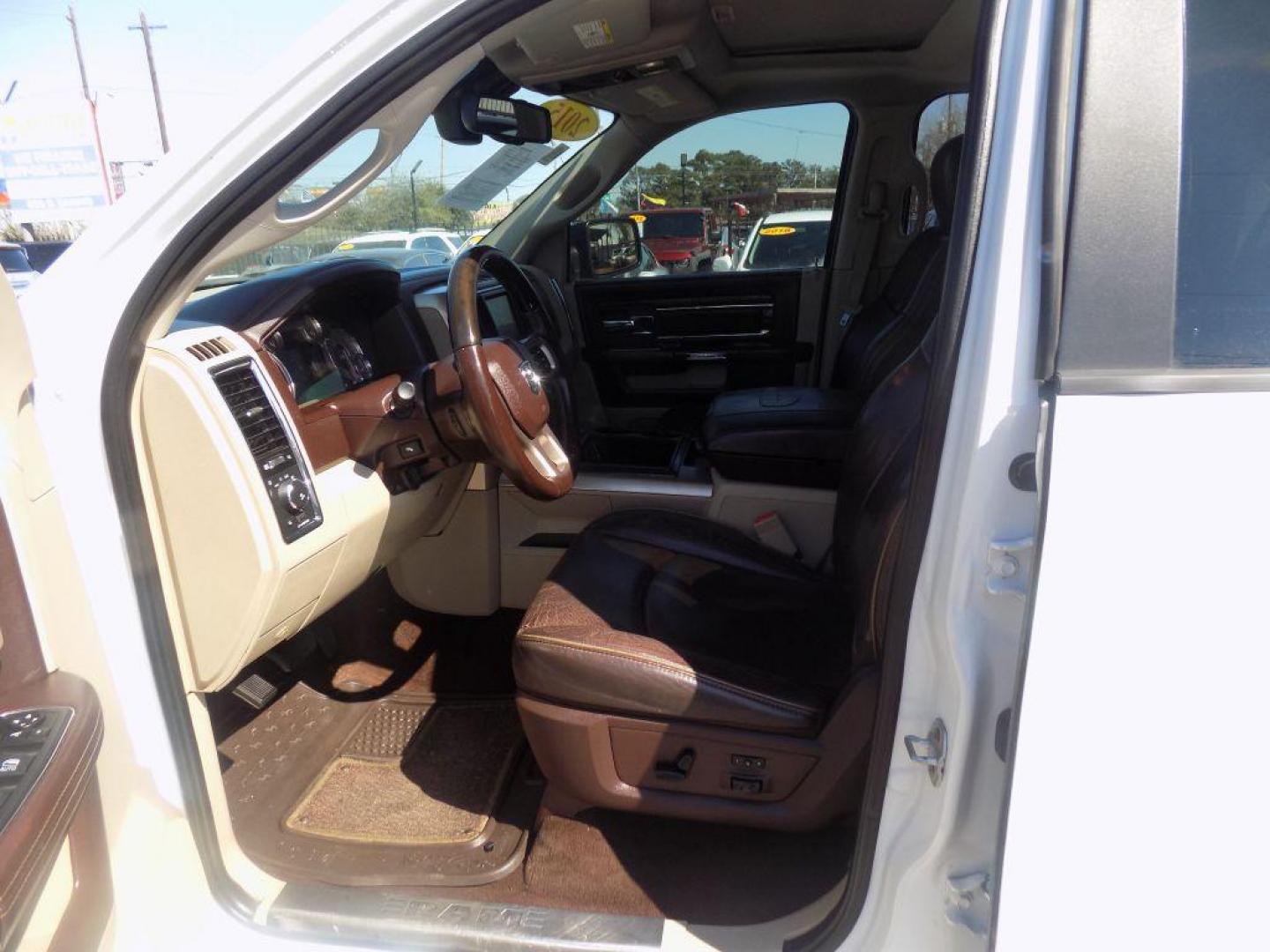 2015 WHITE RAM 1500 LONGHORN (1C6RR6PT9FS) with an 5.7L engine, Automatic transmission, located at 830 E. Canino Rd., Houston, TX, 77037, (281) 405-0440, 38.358219, -81.729942 - Photo#16