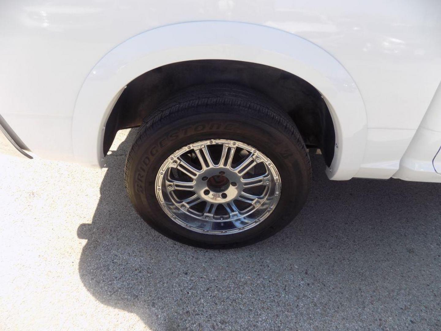 2015 WHITE RAM 1500 LONGHORN (1C6RR6PT9FS) with an 5.7L engine, Automatic transmission, located at 830 E. Canino Rd., Houston, TX, 77037, (281) 405-0440, 38.358219, -81.729942 - Photo#20