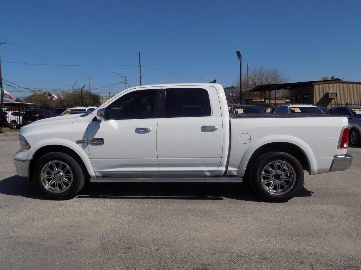 2015 WHITE RAM 1500 LONGHORN (1C6RR6PT9FS) with an 5.7L engine, Automatic transmission, located at 830 E. Canino Rd., Houston, TX, 77037, (281) 405-0440, 38.358219, -81.729942 - Photo#3