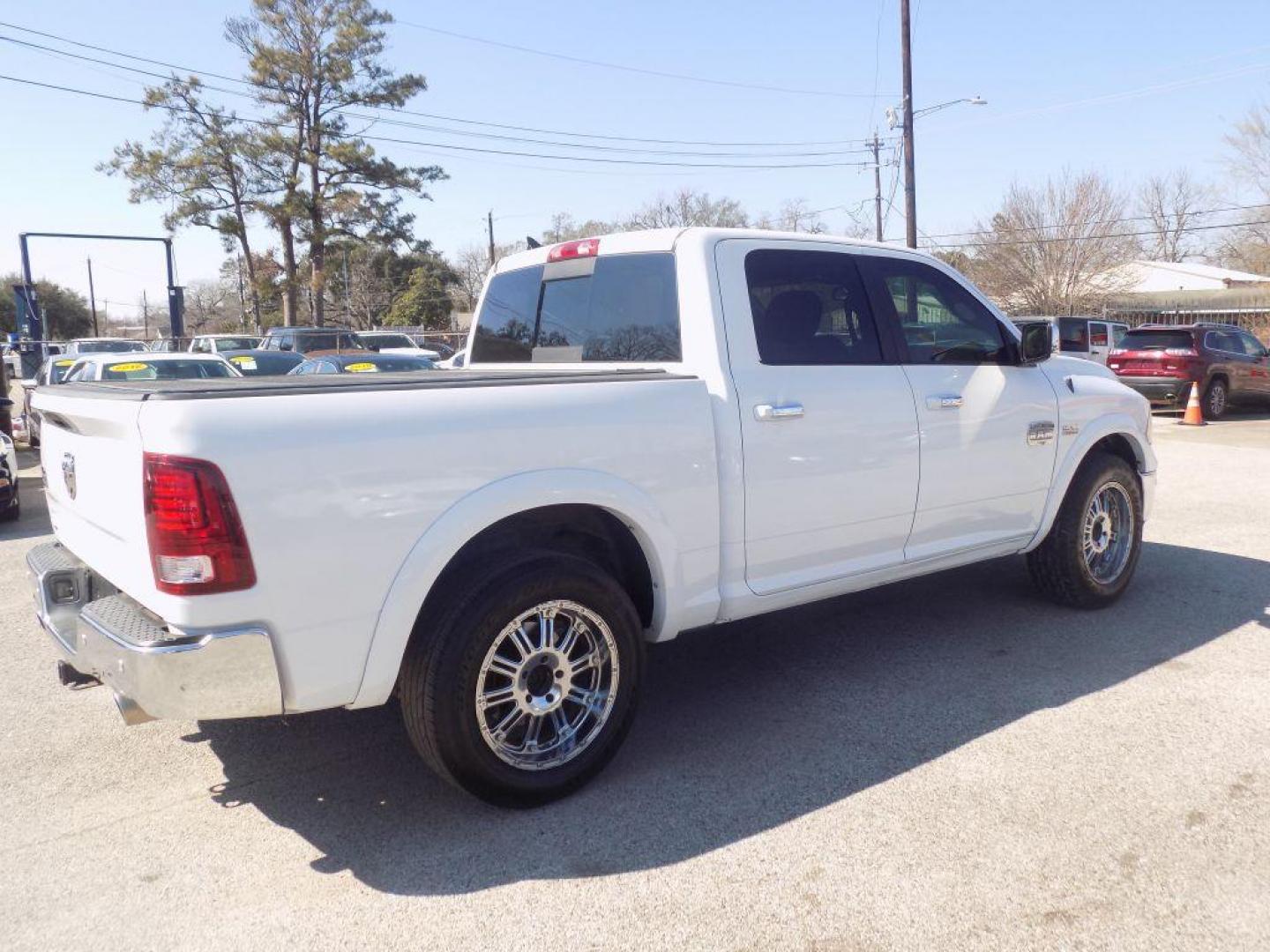2015 WHITE RAM 1500 LONGHORN (1C6RR6PT9FS) with an 5.7L engine, Automatic transmission, located at 830 E. Canino Rd., Houston, TX, 77037, (281) 405-0440, 38.358219, -81.729942 - Photo#7