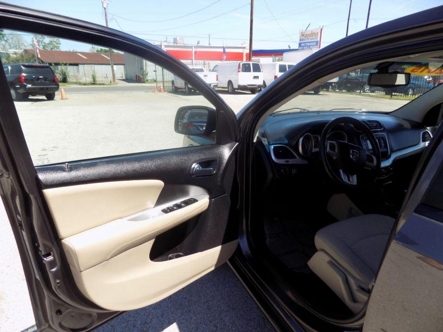 2015 GRAY DODGE JOURNEY SE (3C4PDCAB3FT) with an 2.4L engine, Automatic transmission, located at 830 E. Canino Rd., Houston, TX, 77037, (281) 405-0440, 38.358219, -81.729942 - VENGA A VISITARNOS A CANINO AUTO SALES. ENTRE CAMINANDO Y SALGA MANEJANDO. APROVACION GARANTIZADA CON REQUISITOS MINIMOS! PREGUNTEN POR JESSICA, MAY, O CARRIE PARA SU APROBACION SEGURA. ??830 E CANINO RD HOUSTON TX 77037 ??(281) 405-0440 come visit us today!! walk in/ drive out in minutes! - Photo#14