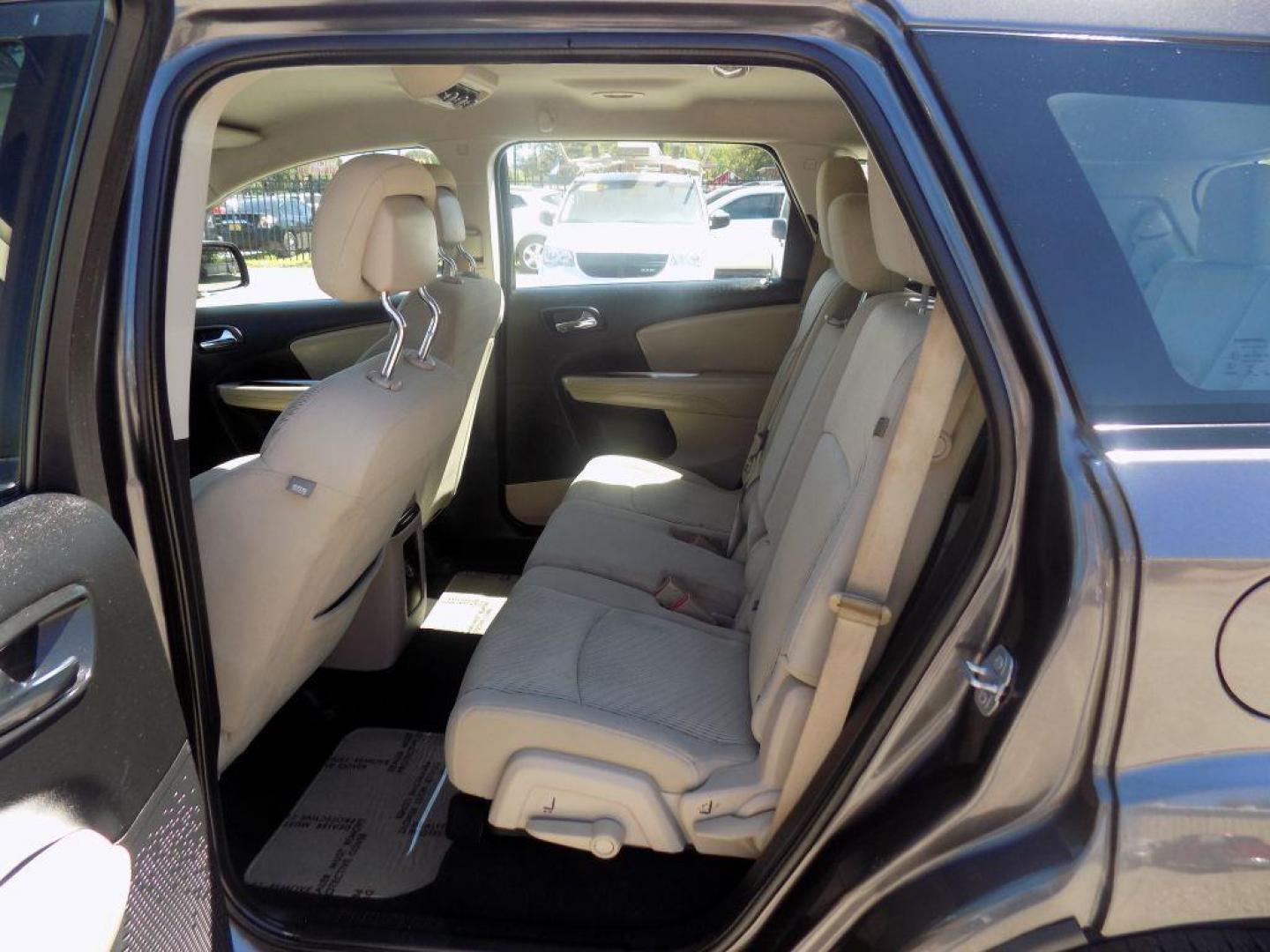 2015 GRAY DODGE JOURNEY SE (3C4PDCAB3FT) with an 2.4L engine, Automatic transmission, located at 830 E. Canino Rd., Houston, TX, 77037, (281) 405-0440, 38.358219, -81.729942 - VENGA A VISITARNOS A CANINO AUTO SALES. ENTRE CAMINANDO Y SALGA MANEJANDO. APROVACION GARANTIZADA CON REQUISITOS MINIMOS! PREGUNTEN POR JESSICA, MAY, O CARRIE PARA SU APROBACION SEGURA. ??830 E CANINO RD HOUSTON TX 77037 ??(281) 405-0440 come visit us today!! walk in/ drive out in minutes! - Photo#17