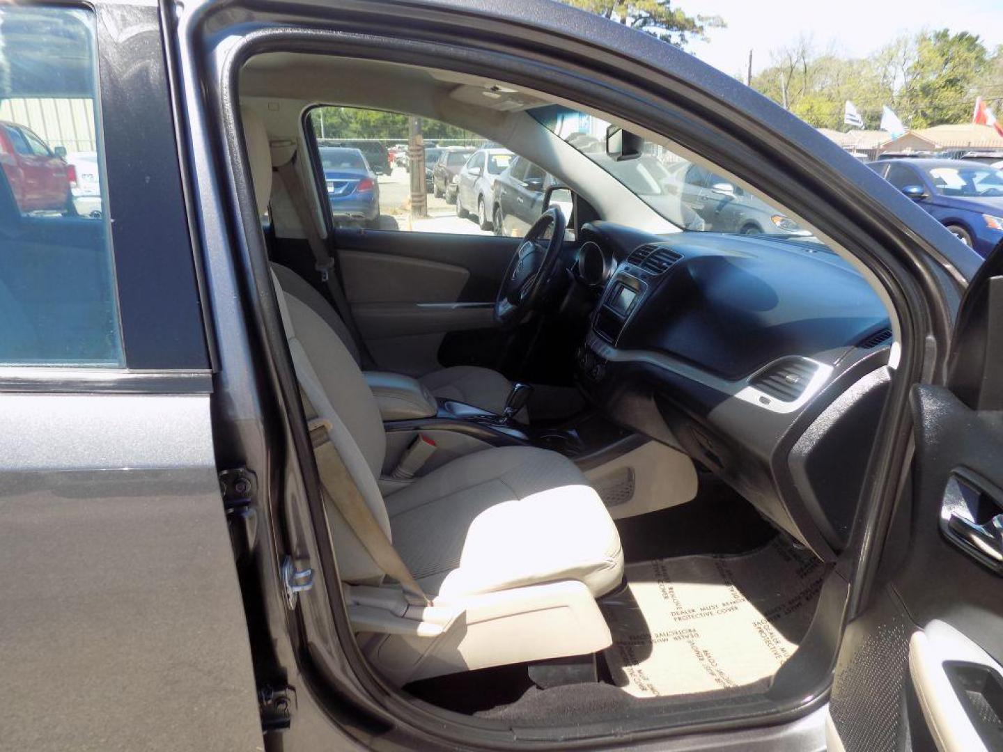 2015 GRAY DODGE JOURNEY SE (3C4PDCAB3FT) with an 2.4L engine, Automatic transmission, located at 830 E. Canino Rd., Houston, TX, 77037, (281) 405-0440, 38.358219, -81.729942 - VENGA A VISITARNOS A CANINO AUTO SALES. ENTRE CAMINANDO Y SALGA MANEJANDO. APROVACION GARANTIZADA CON REQUISITOS MINIMOS! PREGUNTEN POR JESSICA, MAY, O CARRIE PARA SU APROBACION SEGURA. ??830 E CANINO RD HOUSTON TX 77037 ??(281) 405-0440 come visit us today!! walk in/ drive out in minutes! - Photo#21