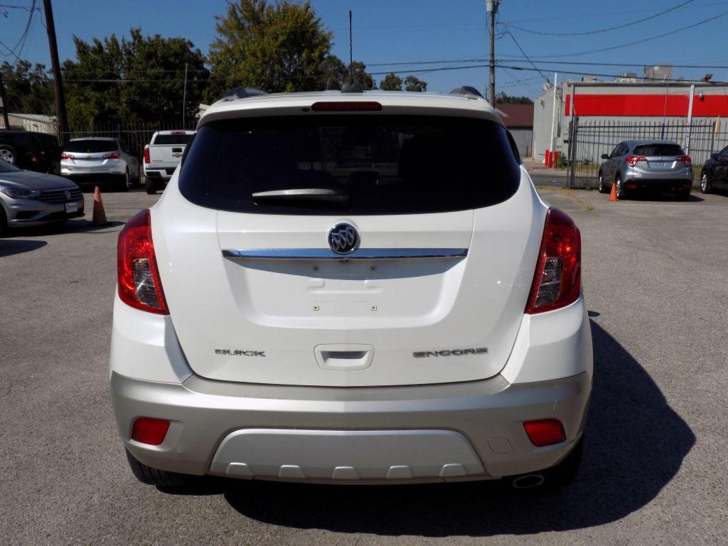 2015 WHITE BUICK ENCORE (KL4CJCSBXFB) with an 1.4L engine, Automatic transmission, located at 830 E. Canino Rd., Houston, TX, 77037, (281) 405-0440, 38.358219, -81.729942 - Photo#4
