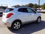 2015 WHITE BUICK ENCORE (KL4CJCSBXFB) with an 1.4L engine, Automatic transmission, located at 830 E. Canino Rd., Houston, TX, 77037, (281) 405-0440, 38.358219, -81.729942 - Photo#5