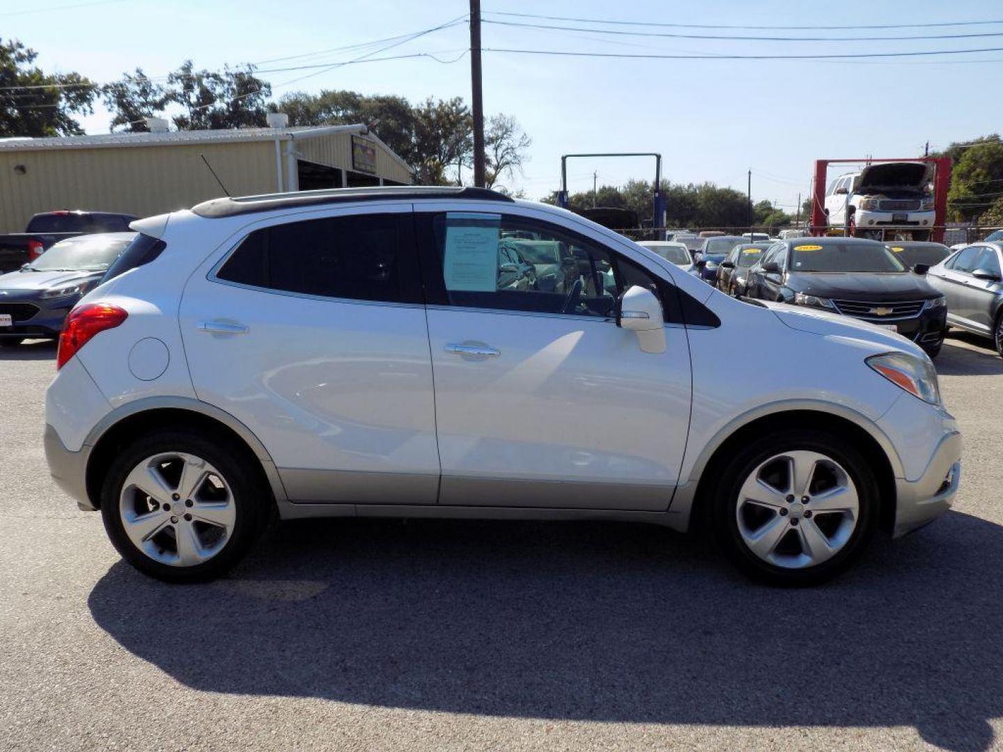 2015 WHITE BUICK ENCORE (KL4CJCSBXFB) with an 1.4L engine, Automatic transmission, located at 830 E. Canino Rd., Houston, TX, 77037, (281) 405-0440, 38.358219, -81.729942 - Photo#6