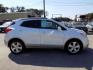 2015 WHITE BUICK ENCORE (KL4CJCSBXFB) with an 1.4L engine, Automatic transmission, located at 830 E. Canino Rd., Houston, TX, 77037, (281) 405-0440, 38.358219, -81.729942 - Photo#6