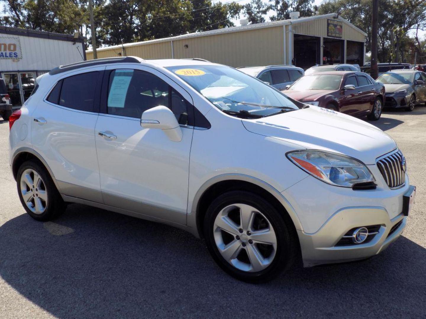 2015 WHITE BUICK ENCORE (KL4CJCSBXFB) with an 1.4L engine, Automatic transmission, located at 830 E. Canino Rd., Houston, TX, 77037, (281) 405-0440, 38.358219, -81.729942 - Photo#7