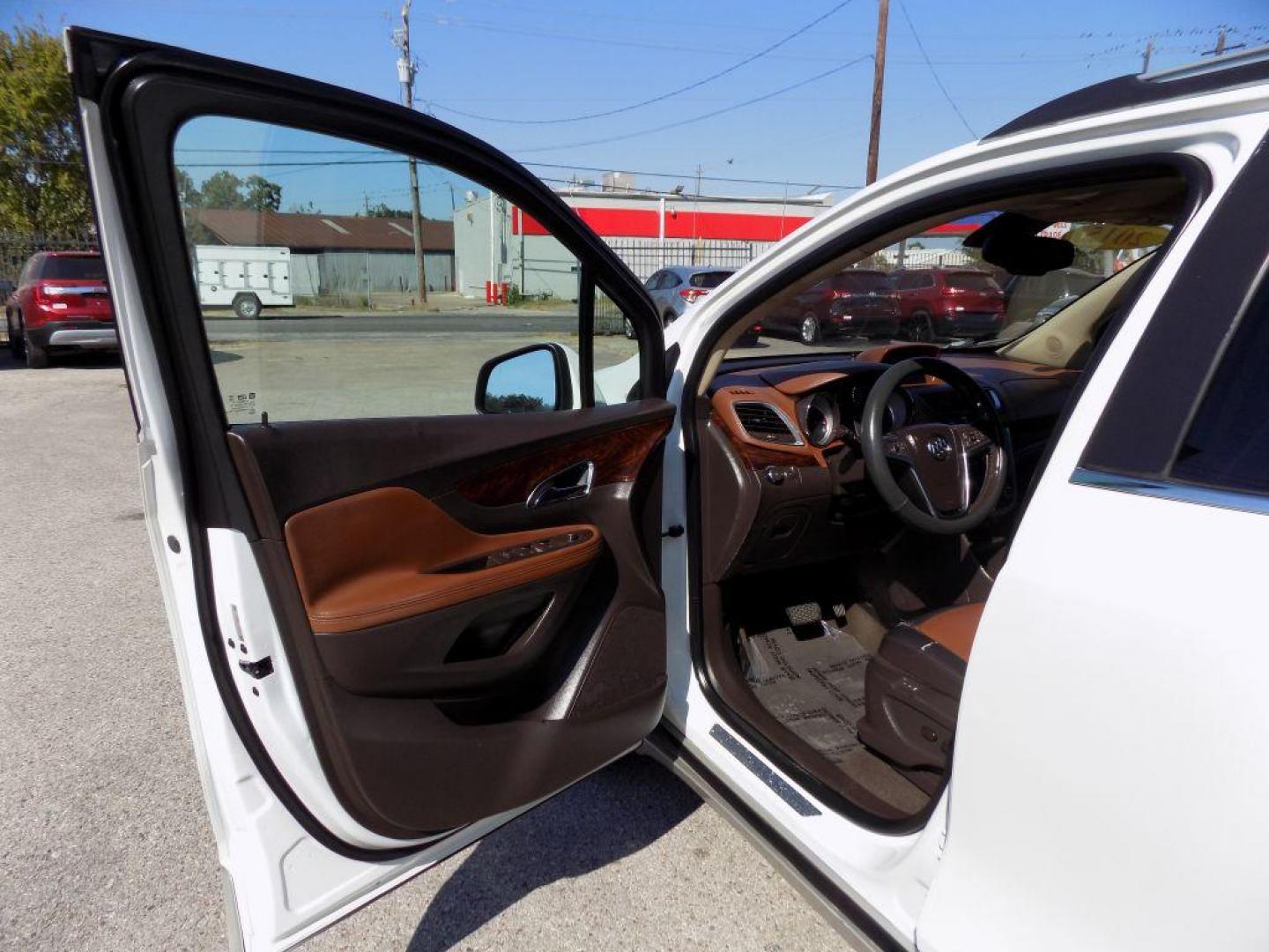 2015 WHITE BUICK ENCORE (KL4CJCSBXFB) with an 1.4L engine, Automatic transmission, located at 830 E. Canino Rd., Houston, TX, 77037, (281) 405-0440, 38.358219, -81.729942 - Photo#8
