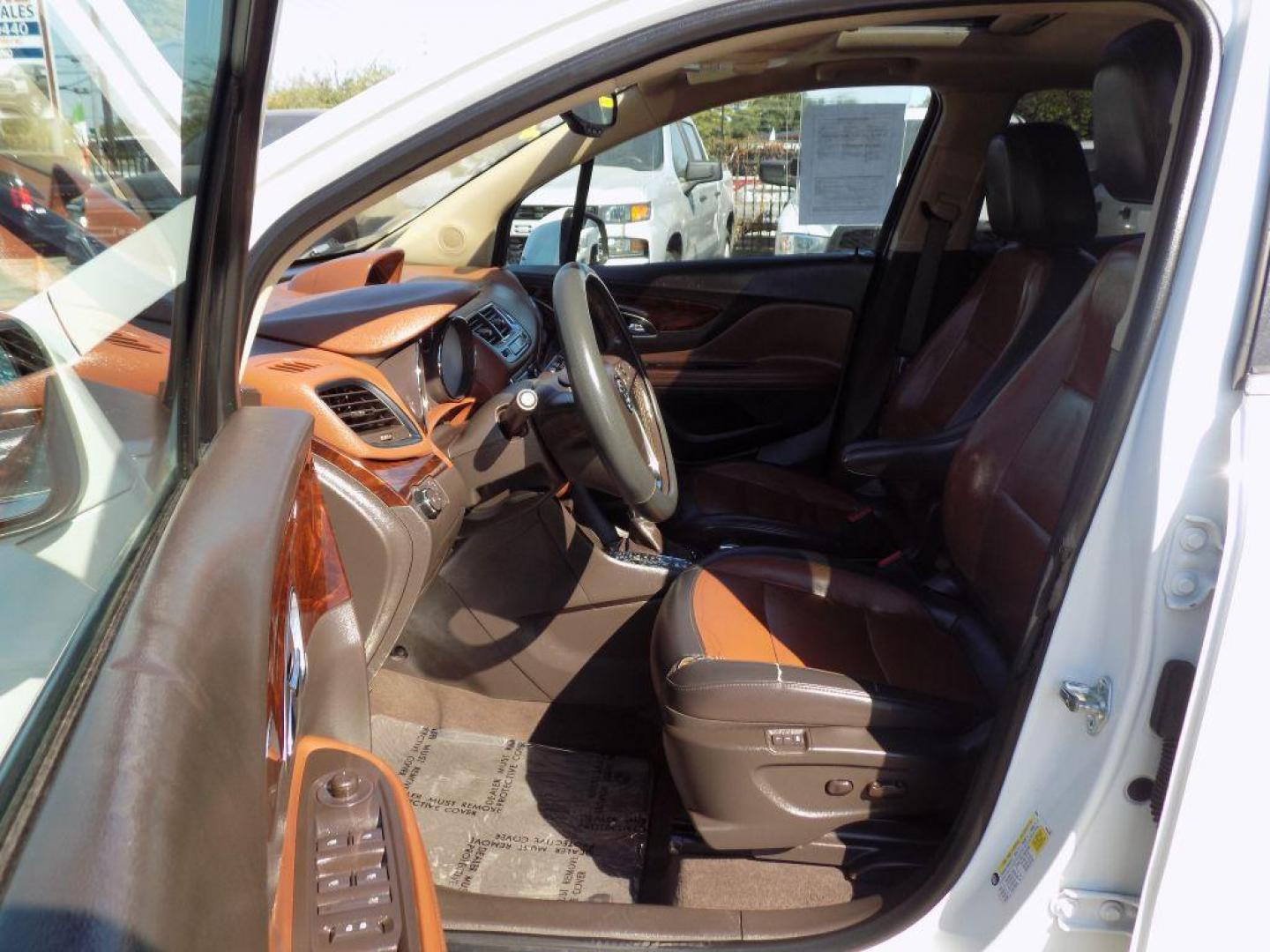 2015 WHITE BUICK ENCORE (KL4CJCSBXFB) with an 1.4L engine, Automatic transmission, located at 830 E. Canino Rd., Houston, TX, 77037, (281) 405-0440, 38.358219, -81.729942 - Photo#9