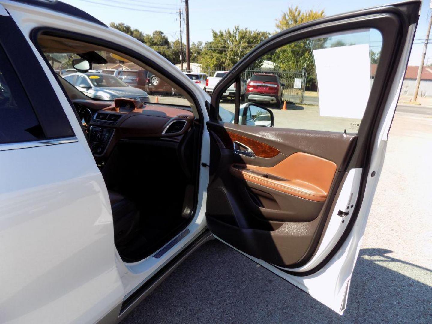 2015 WHITE BUICK ENCORE (KL4CJCSBXFB) with an 1.4L engine, Automatic transmission, located at 830 E. Canino Rd., Houston, TX, 77037, (281) 405-0440, 38.358219, -81.729942 - Photo#12