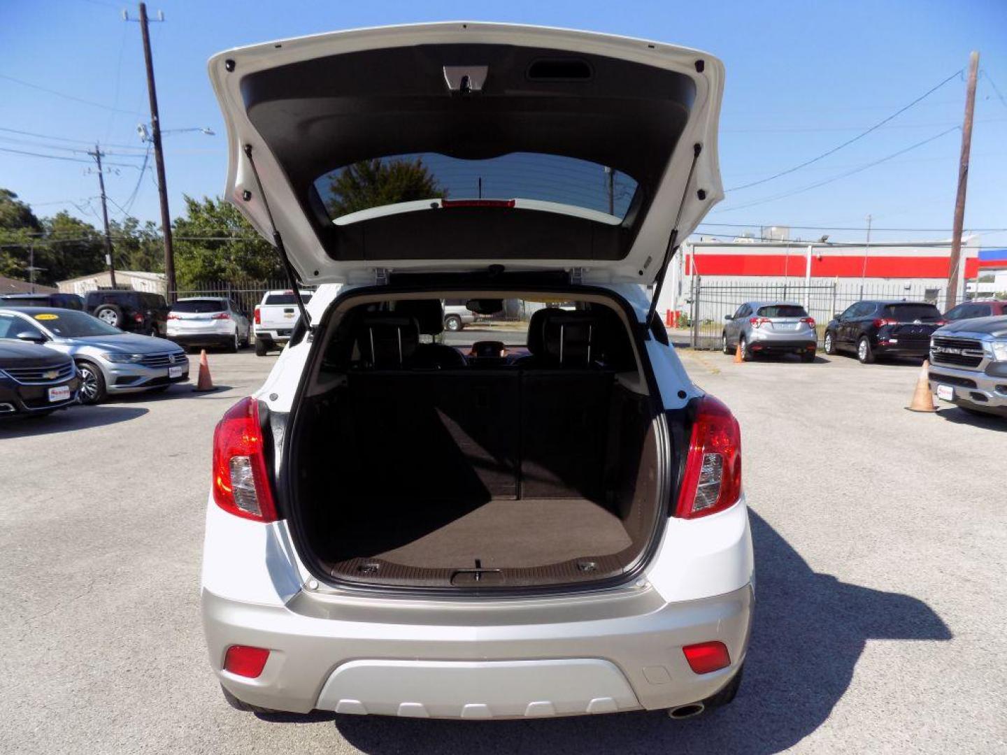 2015 WHITE BUICK ENCORE (KL4CJCSBXFB) with an 1.4L engine, Automatic transmission, located at 830 E. Canino Rd., Houston, TX, 77037, (281) 405-0440, 38.358219, -81.729942 - Photo#16
