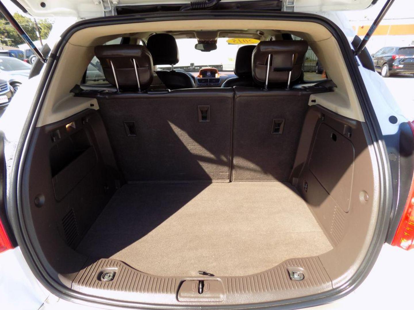 2015 WHITE BUICK ENCORE (KL4CJCSBXFB) with an 1.4L engine, Automatic transmission, located at 830 E. Canino Rd., Houston, TX, 77037, (281) 405-0440, 38.358219, -81.729942 - Photo#17