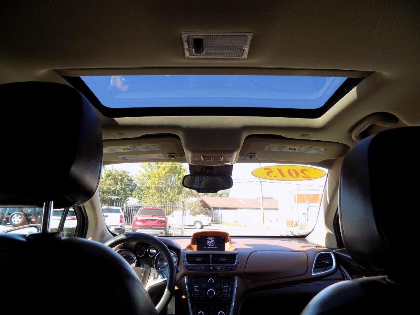 2015 WHITE BUICK ENCORE (KL4CJCSBXFB) with an 1.4L engine, Automatic transmission, located at 830 E. Canino Rd., Houston, TX, 77037, (281) 405-0440, 38.358219, -81.729942 - Photo#19