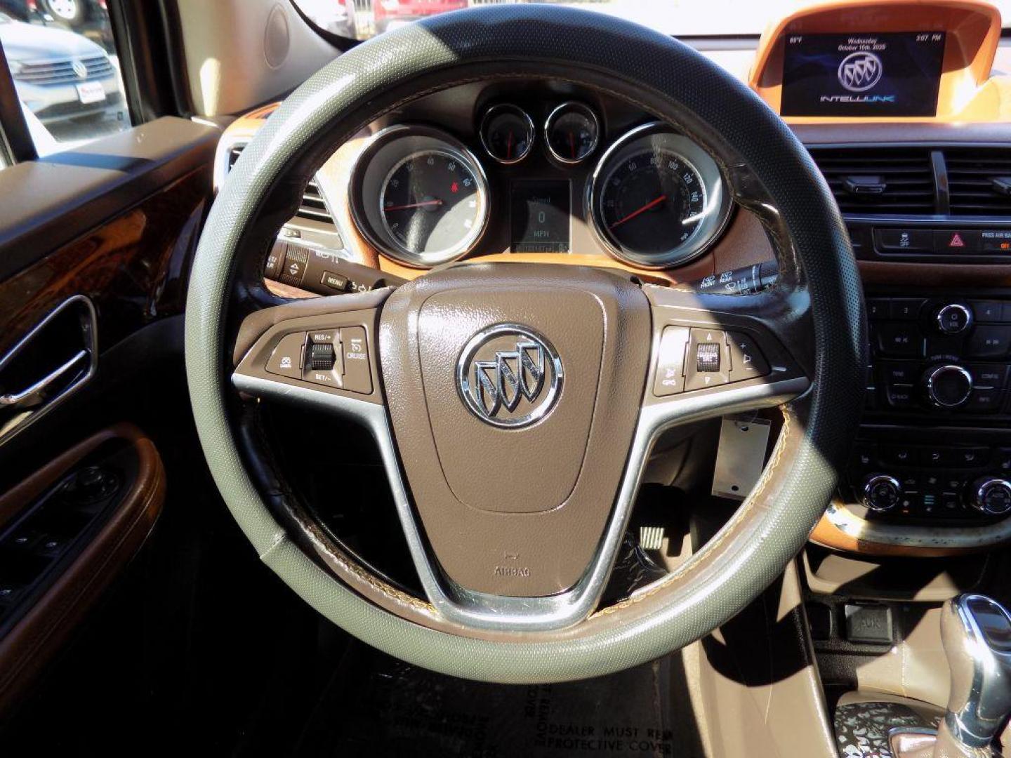 2015 WHITE BUICK ENCORE (KL4CJCSBXFB) with an 1.4L engine, Automatic transmission, located at 830 E. Canino Rd., Houston, TX, 77037, (281) 405-0440, 38.358219, -81.729942 - Photo#22