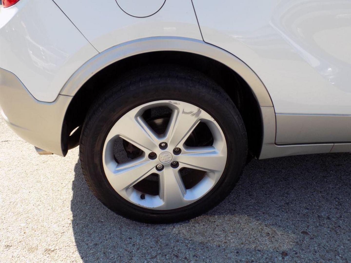 2015 WHITE BUICK ENCORE (KL4CJCSBXFB) with an 1.4L engine, Automatic transmission, located at 830 E. Canino Rd., Houston, TX, 77037, (281) 405-0440, 38.358219, -81.729942 - Photo#23