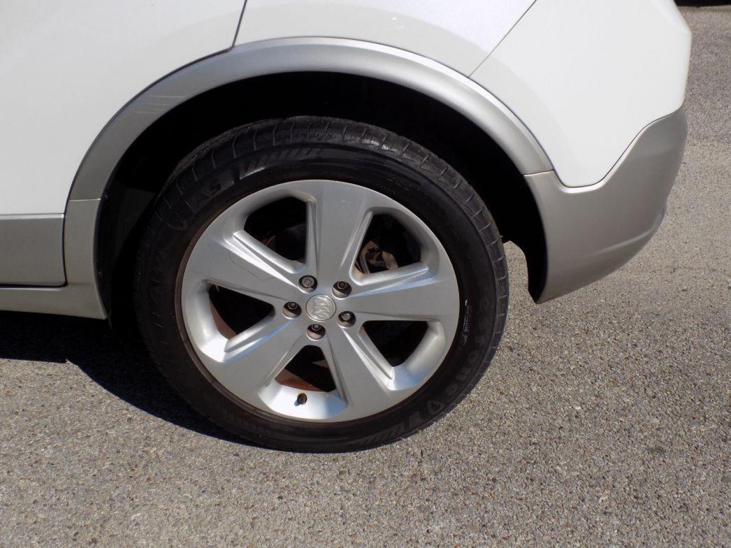 2015 WHITE BUICK ENCORE (KL4CJCSBXFB) with an 1.4L engine, Automatic transmission, located at 830 E. Canino Rd., Houston, TX, 77037, (281) 405-0440, 38.358219, -81.729942 - Photo#26