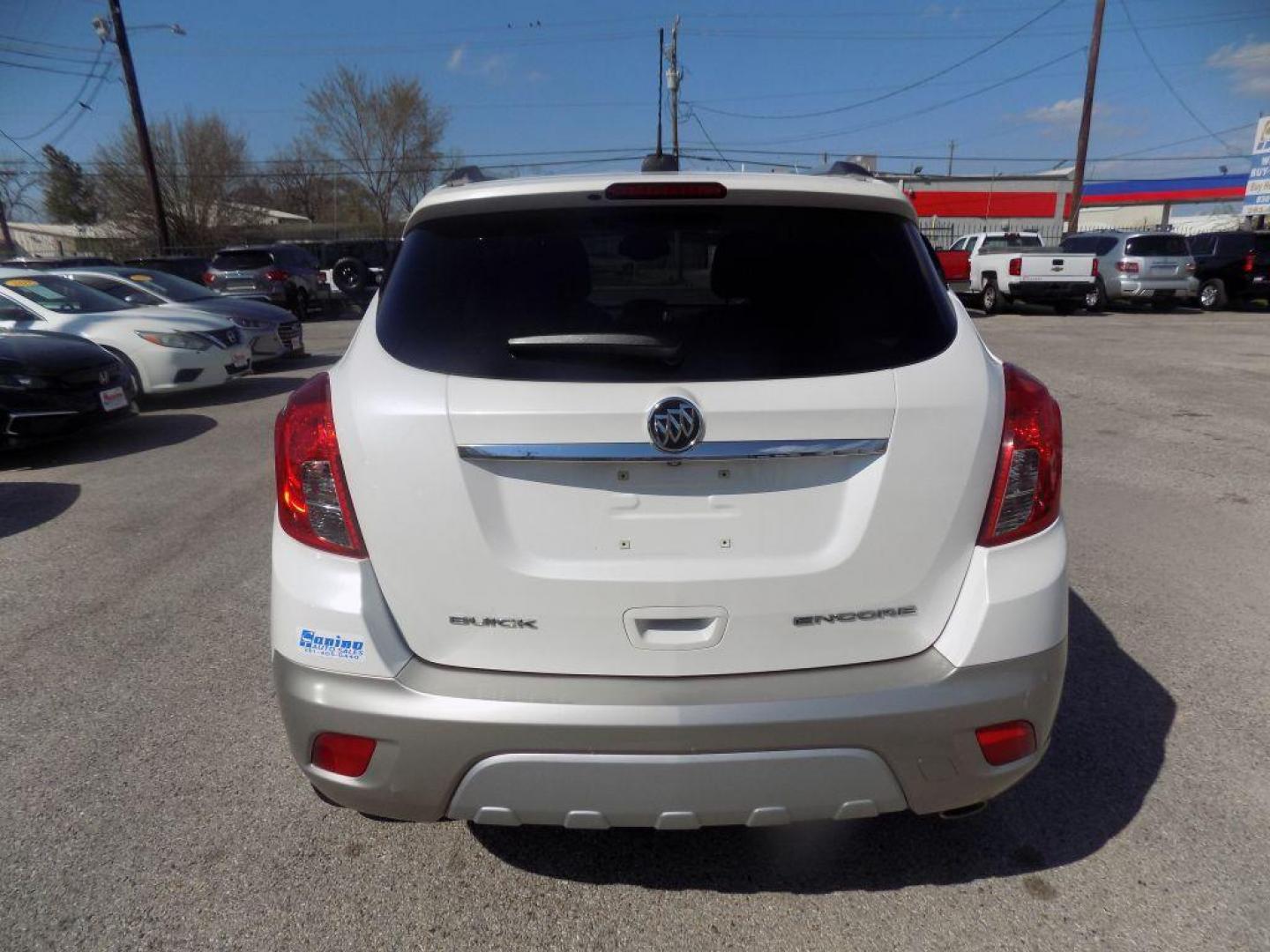 2015 WHITE BUICK ENCORE (KL4CJCSBXFB) with an 1.4L engine, Automatic transmission, located at 830 E. Canino Rd., Houston, TX, 77037, (281) 405-0440, 38.358219, -81.729942 - PRE APPROVACION FACIL, RAPIDA.... PROCESSO RAPIDO LLAMA O VISITANOS HOY MISMO ESTAMOS LOCALIZADOS EN EL 830 E. CANINO RD (ESQUINA CON AIRLINE) HOUSTON, TEXAS 777037 SU TRABAJO ES SU CREDITO!! ENTRE CAMINANDO Y SALGA MANEJANDO! LLAME YA AL (281) 405-0440 LE ESPERAMOS! - Photo#2