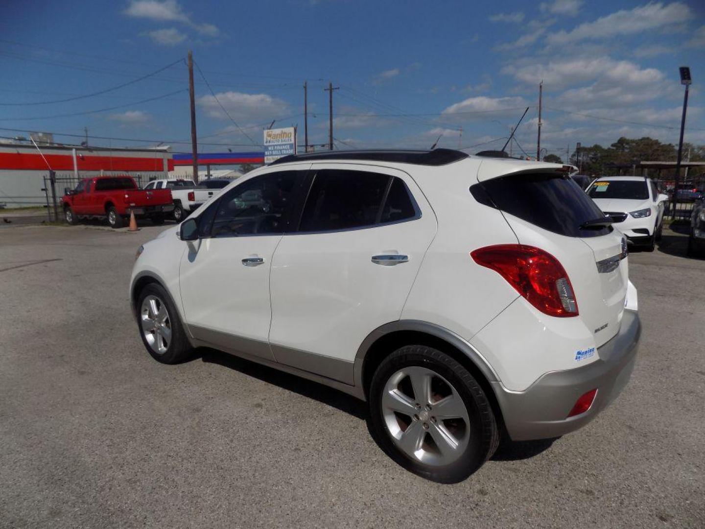 2015 WHITE BUICK ENCORE (KL4CJCSBXFB) with an 1.4L engine, Automatic transmission, located at 830 E. Canino Rd., Houston, TX, 77037, (281) 405-0440, 38.358219, -81.729942 - PRE APPROVACION FACIL, RAPIDA.... PROCESSO RAPIDO LLAMA O VISITANOS HOY MISMO ESTAMOS LOCALIZADOS EN EL 830 E. CANINO RD (ESQUINA CON AIRLINE) HOUSTON, TEXAS 777037 SU TRABAJO ES SU CREDITO!! ENTRE CAMINANDO Y SALGA MANEJANDO! LLAME YA AL (281) 405-0440 LE ESPERAMOS! - Photo#4