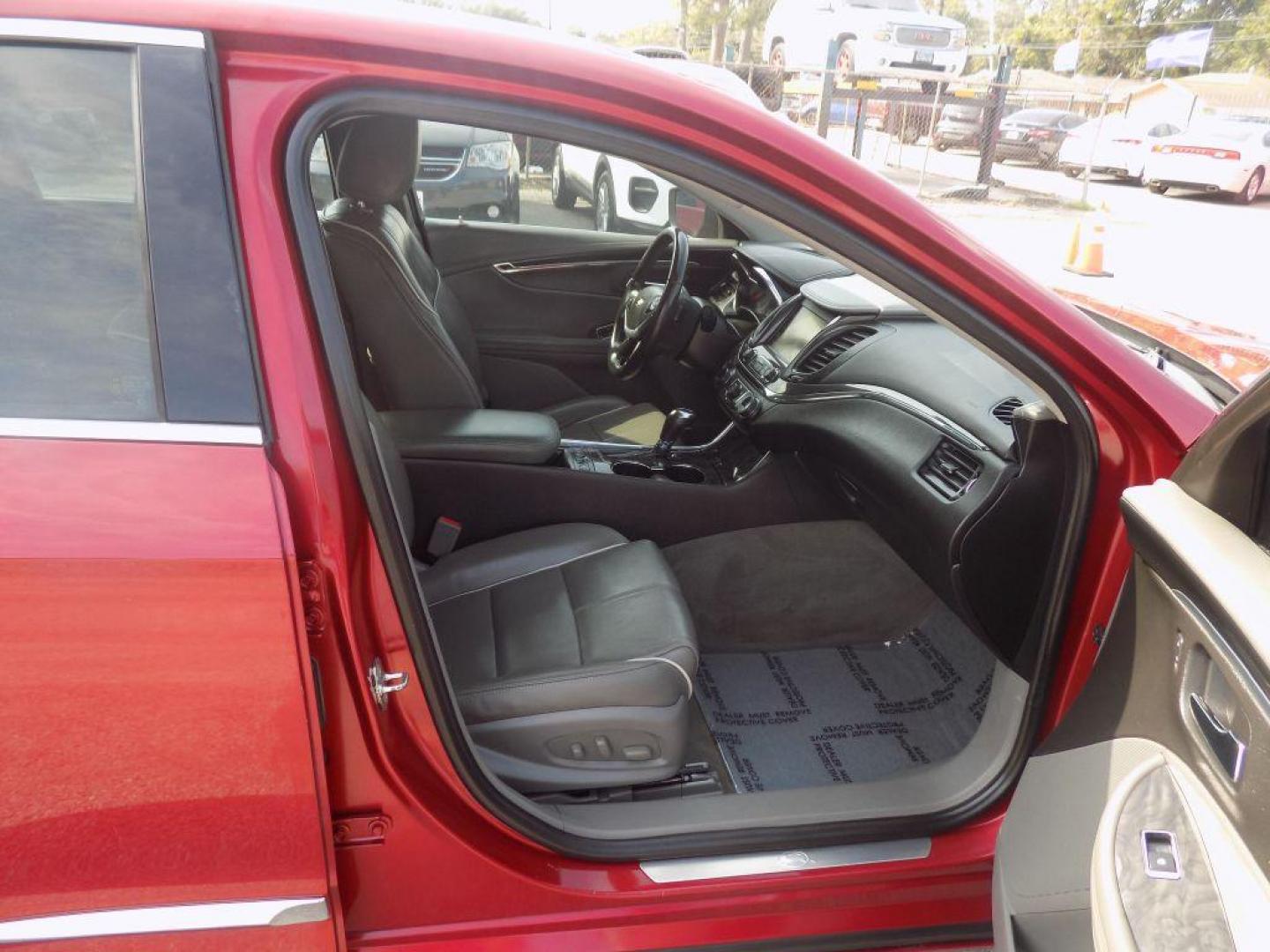 2015 RED CHEVROLET IMPALA LTZ (1G1165S38FU) with an 3.6L engine, Automatic transmission, located at 830 E. Canino Rd., Houston, TX, 77037, (281) 405-0440, 38.358219, -81.729942 - Photo#9