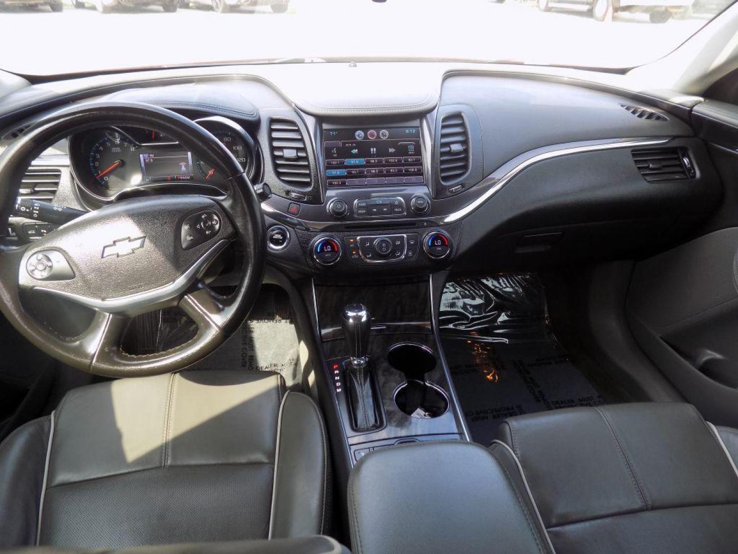2015 RED CHEVROLET IMPALA LTZ (1G1165S38FU) with an 3.6L engine, Automatic transmission, located at 830 E. Canino Rd., Houston, TX, 77037, (281) 405-0440, 38.358219, -81.729942 - Photo#14