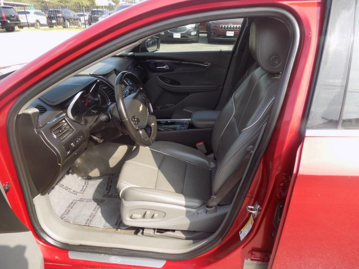 2015 RED CHEVROLET IMPALA LTZ (1G1165S38FU) with an 3.6L engine, Automatic transmission, located at 830 E. Canino Rd., Houston, TX, 77037, (281) 405-0440, 38.358219, -81.729942 - Photo#16