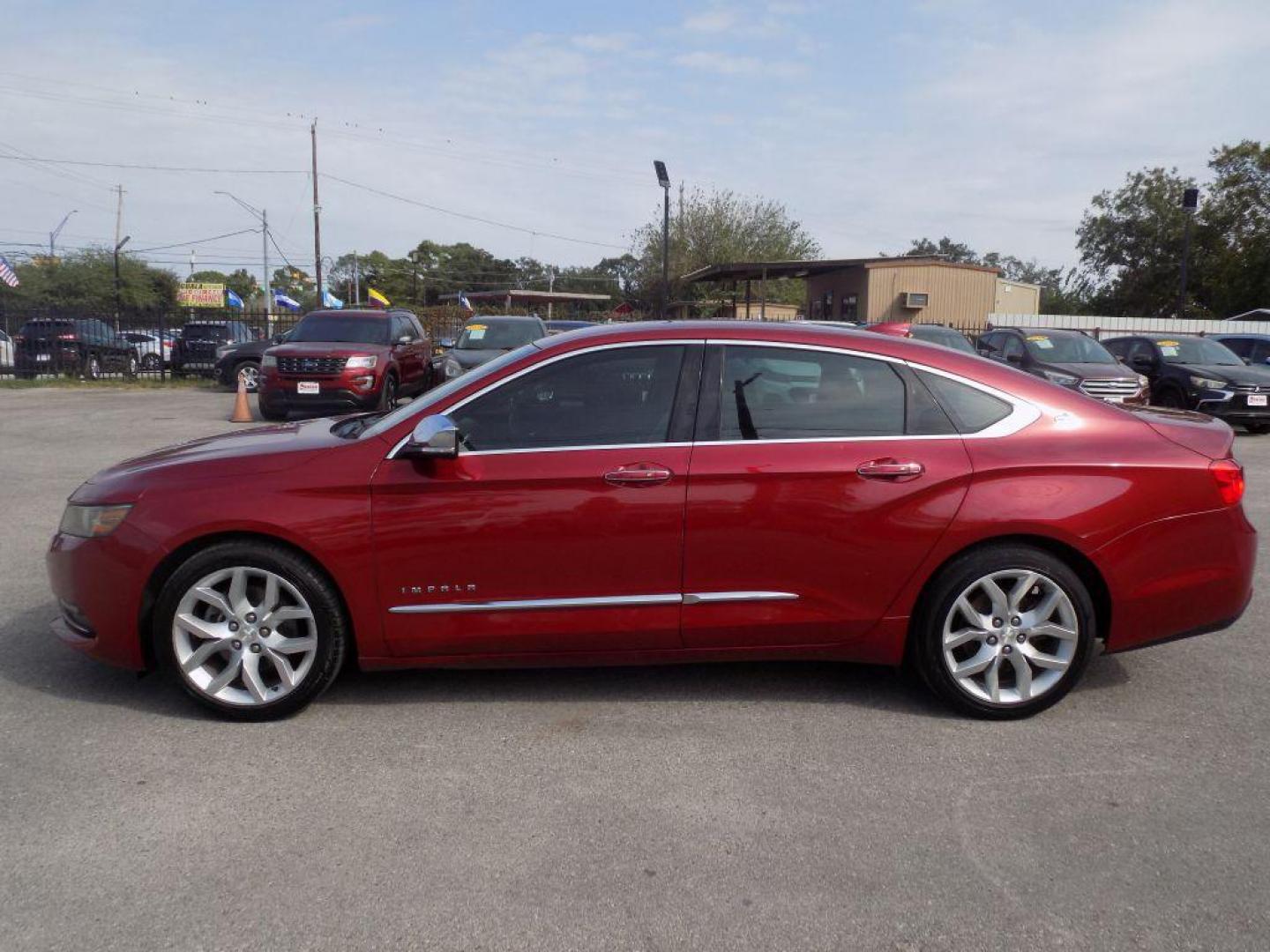 2015 RED CHEVROLET IMPALA LTZ (1G1165S38FU) with an 3.6L engine, Automatic transmission, located at 830 E. Canino Rd., Houston, TX, 77037, (281) 405-0440, 38.358219, -81.729942 - Photo#3