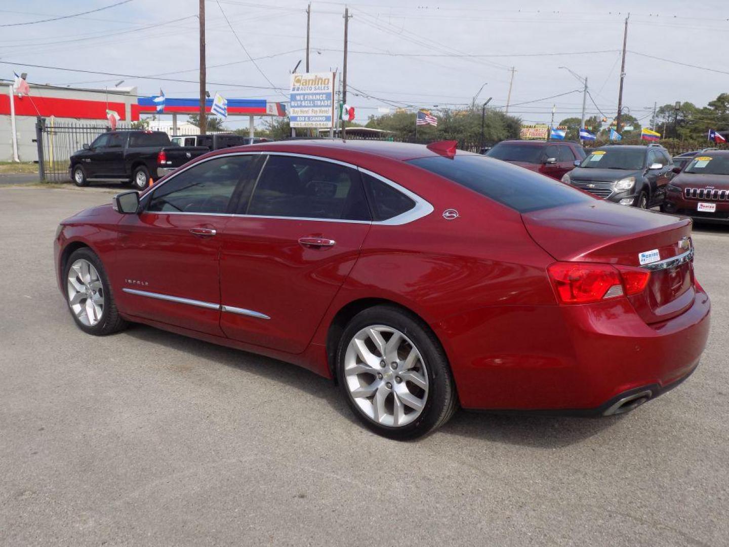 2015 RED CHEVROLET IMPALA LTZ (1G1165S38FU) with an 3.6L engine, Automatic transmission, located at 830 E. Canino Rd., Houston, TX, 77037, (281) 405-0440, 38.358219, -81.729942 - Photo#4
