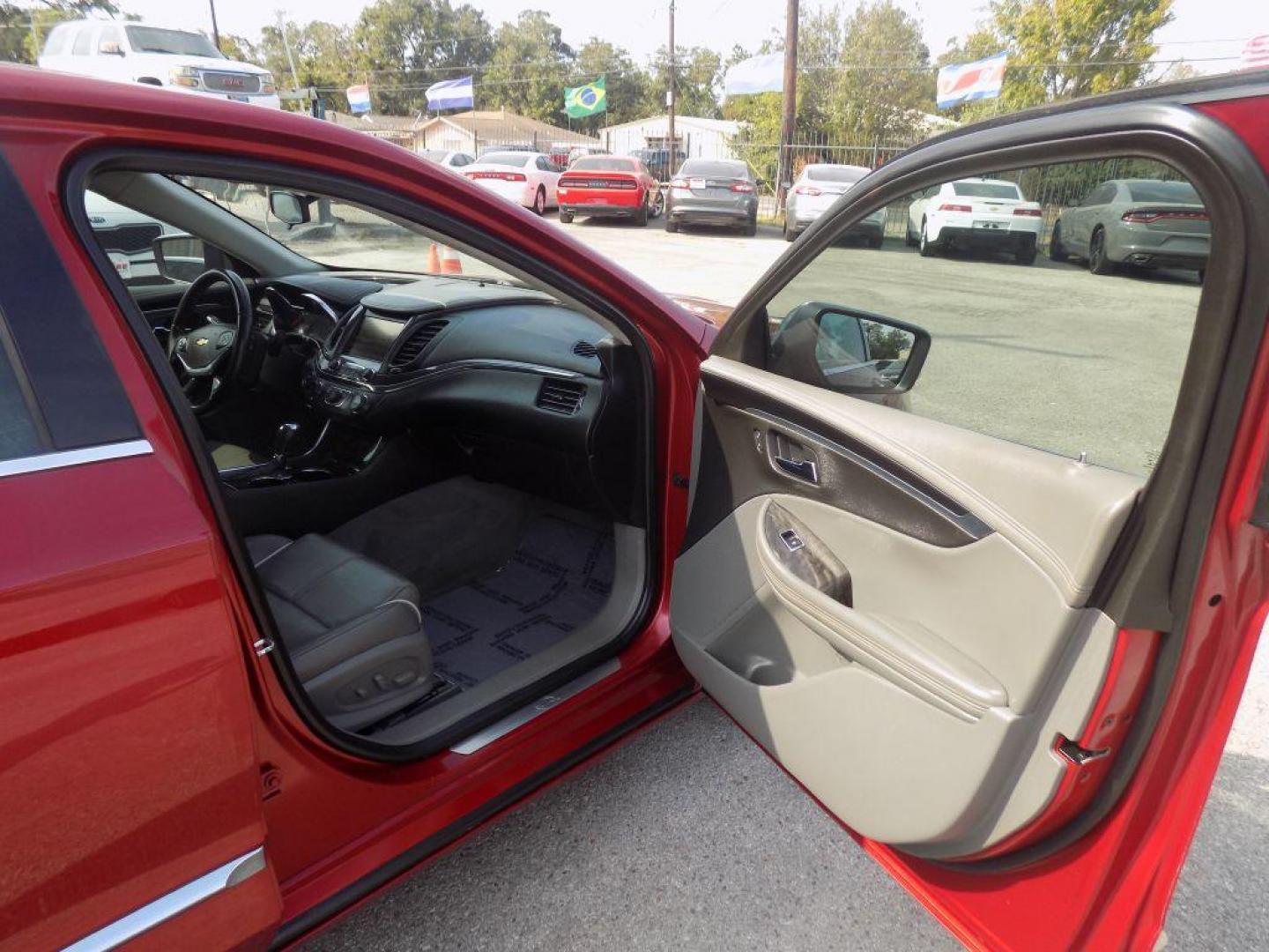 2015 RED CHEVROLET IMPALA LTZ (1G1165S38FU) with an 3.6L engine, Automatic transmission, located at 830 E. Canino Rd., Houston, TX, 77037, (281) 405-0440, 38.358219, -81.729942 - Photo#8