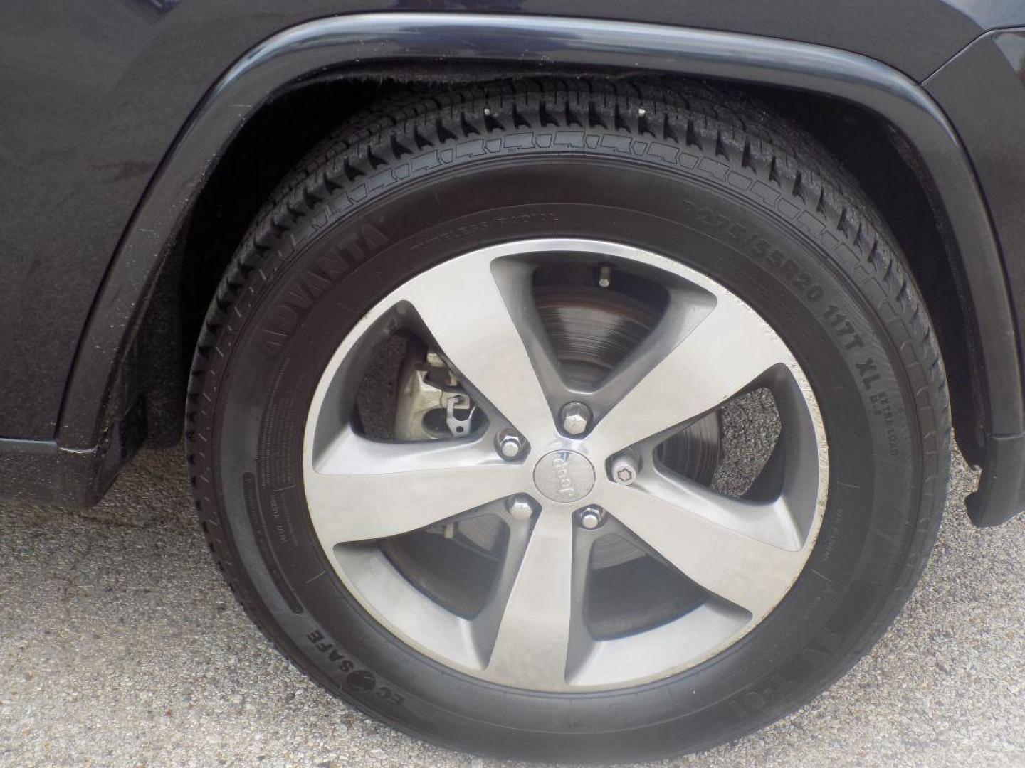 2014 BLACK JEEP GRAND CHEROKEE OVERLAND (1C4RJECT8EC) with an 5.7L engine, Automatic transmission, located at 830 E. Canino Rd., Houston, TX, 77037, (281) 405-0440, 38.358219, -81.729942 - Photo#9