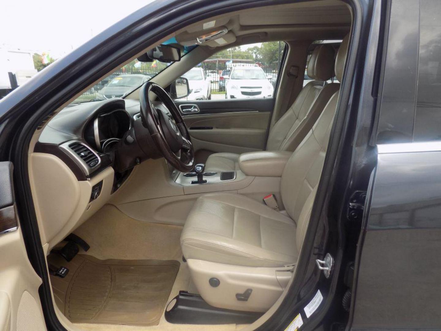 2014 BLACK JEEP GRAND CHEROKEE OVERLAND (1C4RJECT8EC) with an 5.7L engine, Automatic transmission, located at 830 E. Canino Rd., Houston, TX, 77037, (281) 405-0440, 38.358219, -81.729942 - Photo#13
